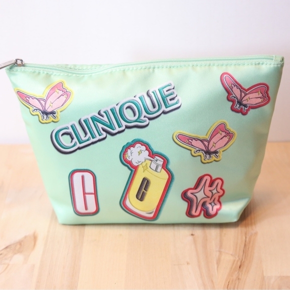 Clinique Handbags - Clinique Mint Green Cosmetic Bag with Colorful Accents